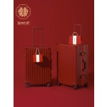A pair of red leather wedding suitcases/dowry trunks for brides, featuring a combination lock.